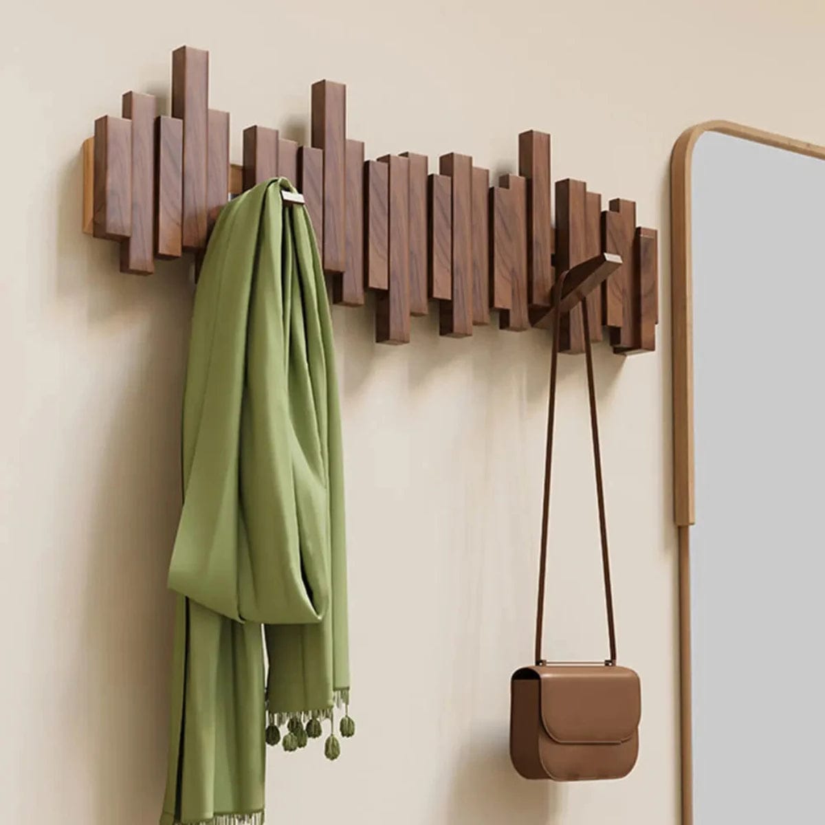 Kapstok piano en bois élégant pour vestes et manteaux. Design intemporel, accrochage mural facile.